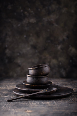 Handcrafted tableware, plates, bowls and spoonの写真素材