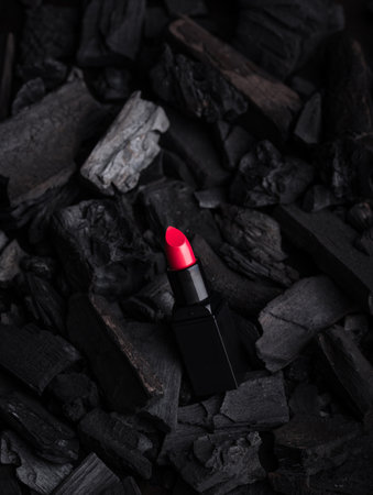 Red lipstick on charcoal backgroundの写真素材