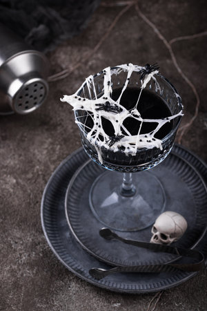 Halloween cocktail with spider cobwebの写真素材