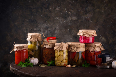 Pickled vegetables in glass jars.の写真素材