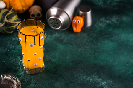 Spooky Halloween cocktail with eyesの写真素材