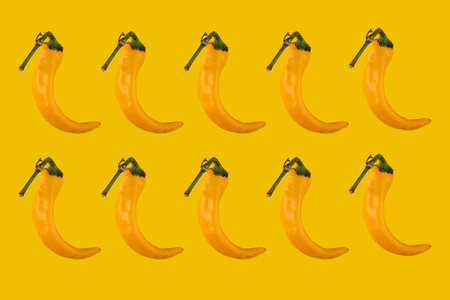 Vibrant banana pattern on yellow backgroundの写真素材