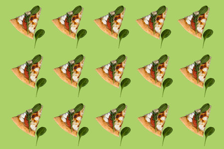 Appetizing pizza slices against green backdrop