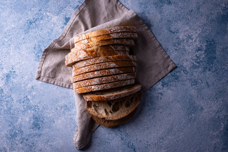 Sliced bread on blue backgrounsの写真素材