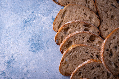 Sliced bread on blue backgrouns