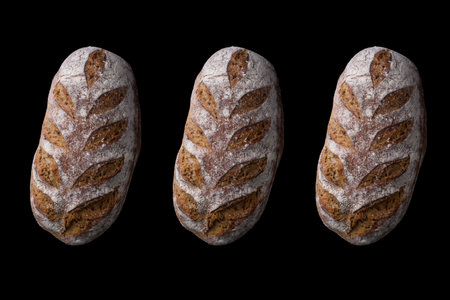 Freshly baked artisanal loaves of breadの写真素材