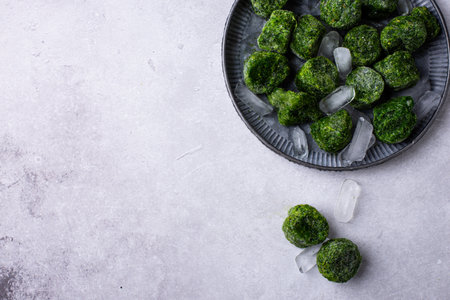 Frozen spinach green cubesの写真素材
