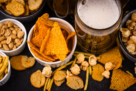 Beer and different snacks for Superbowl or football partyの写真素材