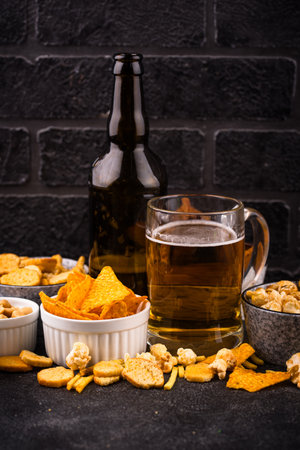 Beer and different snacks for Superbowl or football partyの写真素材