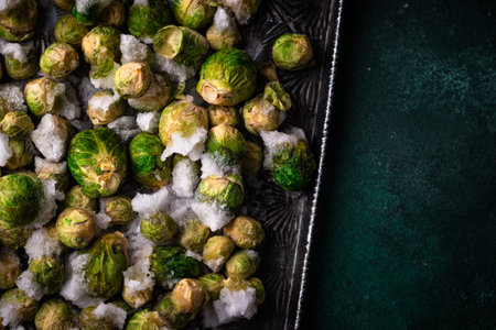 Frozen Brussels sprouts on dark backgroundの写真素材