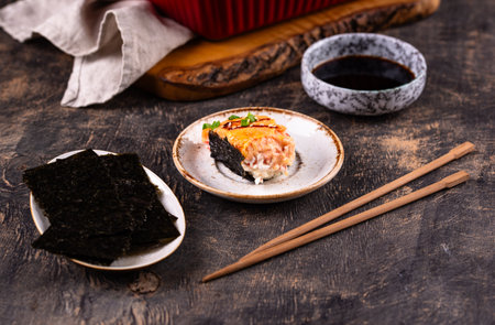 Baked sushi roll with crab surimi sticksの写真素材