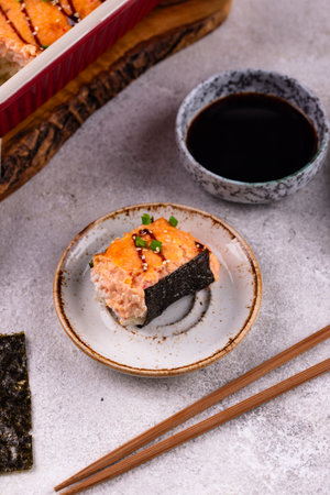 Baked sushi roll cake with crab surimi sticksの写真素材