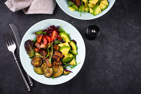 Healthy vegan keto salad with tofu and avocadoの写真素材