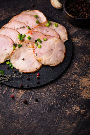 Sliced chicken sausage with herbsの写真素材