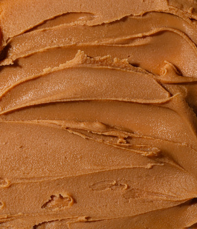 Peanut butter texture background isolated