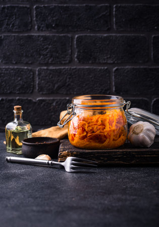 Spicy korean carrot salad in jarの写真素材