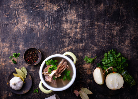 Boiled bone broth or bouillon with meatの写真素材