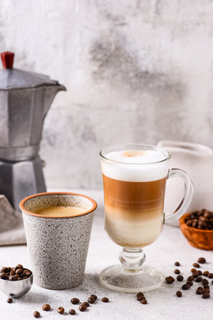 Espresso and cappuccino. Different coffeeの写真素材