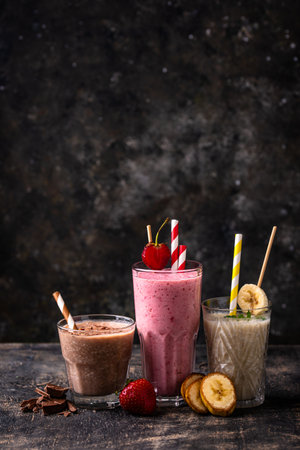 Milkshake from strawberry, banana and chocolateの写真素材