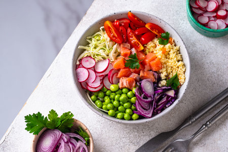 Balanced healthy bowl with vegetables and salmon