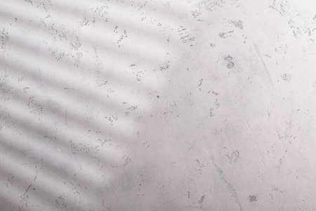 White wall background with hard shadow
