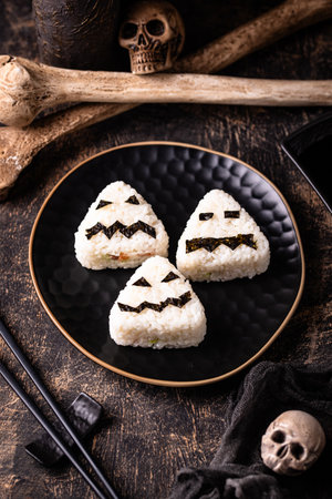 Halloween sushi onigiri in shape of mosterの写真素材