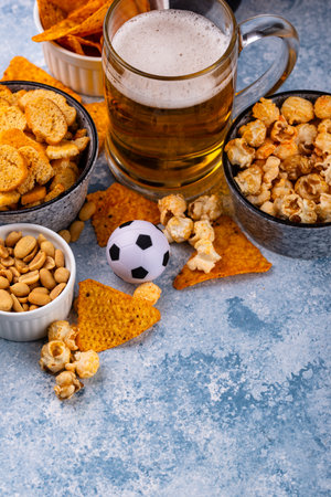Beer and different snacks for Superbowl or football partyの写真素材