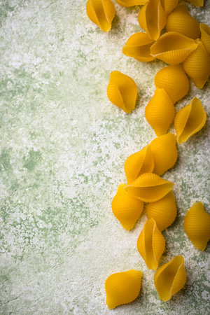 Raw pasta in shape of shellsの写真素材