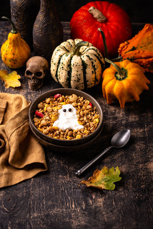 Halloween breakfast. Granola and ghost from yogurtの写真素材