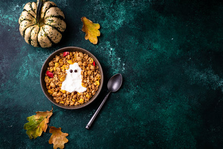 Halloween breakfast. Granola and ghost from yogurtの写真素材