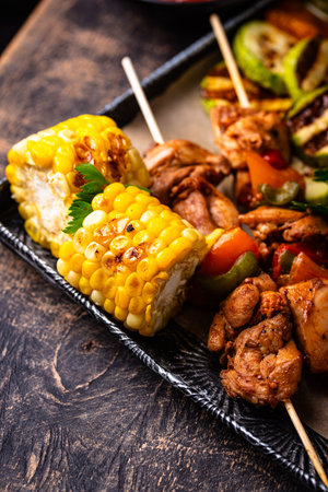 Assortment of grilled bbq meat and vegetablesの写真素材