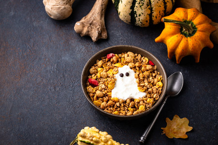 Halloween breakfast. Granola and ghost from yogurtの写真素材