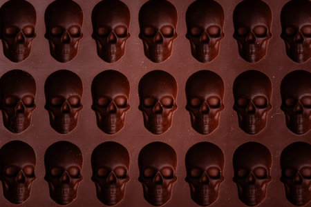 Silicon mold in shape of skull for Halloween chocolateの写真素材