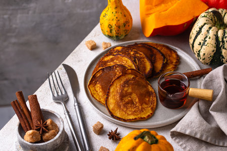 Pumpkin pancakes with maple syrupの写真素材