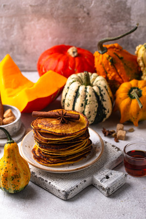 Pumpkin pancakes with maple syrupの写真素材