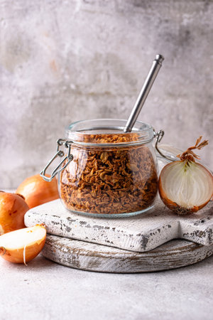 Bowl with chopped fried crispy onionsの写真素材