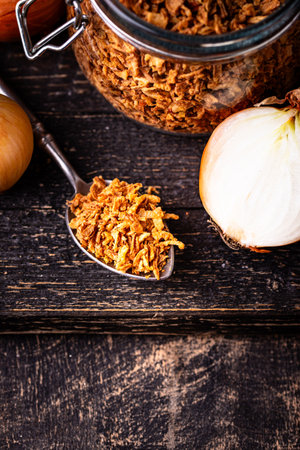 Bowl with chopped fried crispy onionsの写真素材