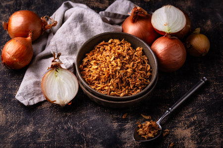 Bowl with chopped fried crispy onionsの写真素材