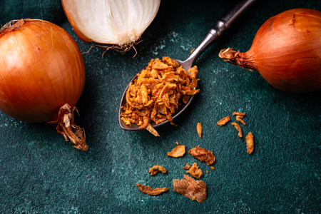 Bowl with chopped fried crispy onionsの写真素材