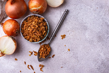 Bowl with chopped fried crispy onionsの写真素材