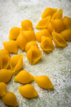 Raw pasta in shape of shellsの写真素材