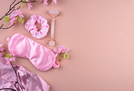 Silk sleep pink eye mask and accessory.の写真素材