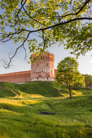 Russia, Smolensk. 26 May 2016. The ancient city wall in the evening sunlight.のeditorial素材