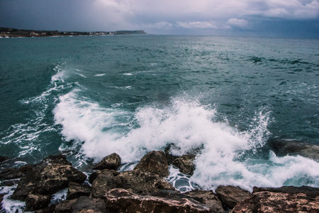 waves in the mediterranean sea during rain in Cyprus