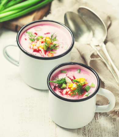 Traditional beetroot cold summer soup served in mugsの写真素材