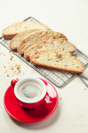 Traditional italian cookies and coffee on stone backgroundの写真素材