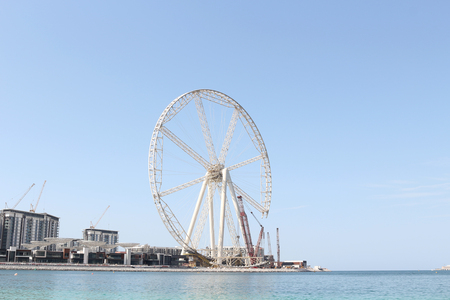 Giant ferris wheel is located near Dubai Marina Bay. November 23, 2017. Dubai, UAE. Editorial use onlyのeditorial素材