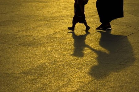 silhouette of mother and child の写真素材