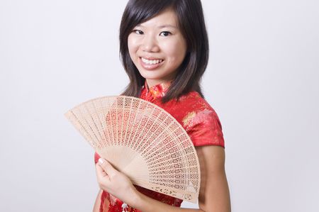 chinese new year girl with fanの写真素材