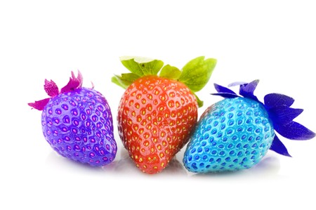 multi colored strawberries with white isolated background の写真素材